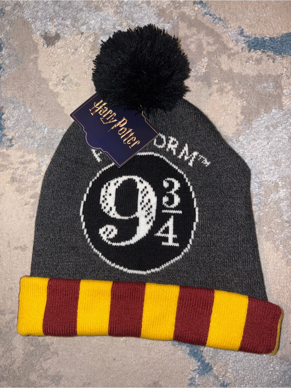 Warner Bros. Platform 9 3/4 Pom Beanie - Gray with Gryffindor Stripe